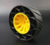 Ein Rad, bestehend aus einer Hartkomponente als Felge und einer Weichkomponente für den flexiblen Reifen